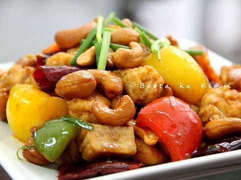 Phad med mamuang kai - Thais gebakken kip, cashewnoten en groenten